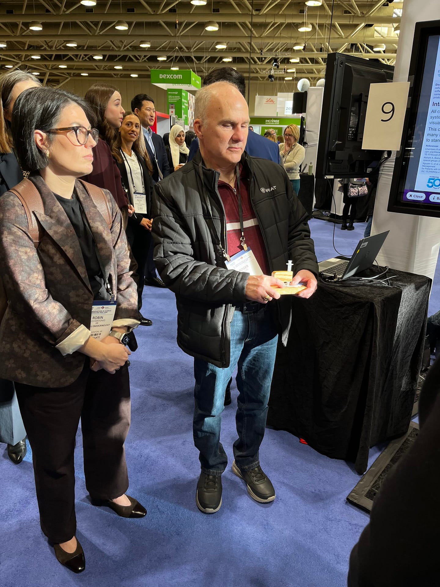 Roger demonstrating his tactile AID setup, operating the system non-visually.